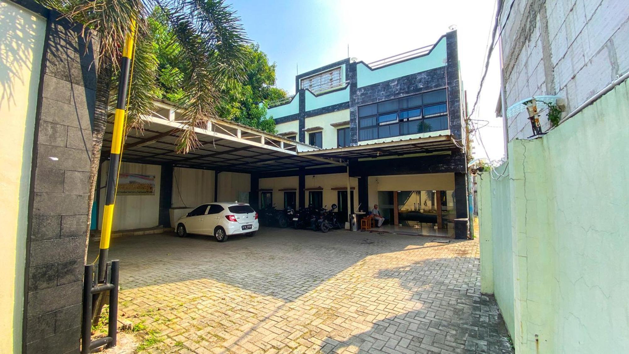 Nusa Indah Syariah Hotel Bandara By Abdihome Tangerang Bagian luar foto